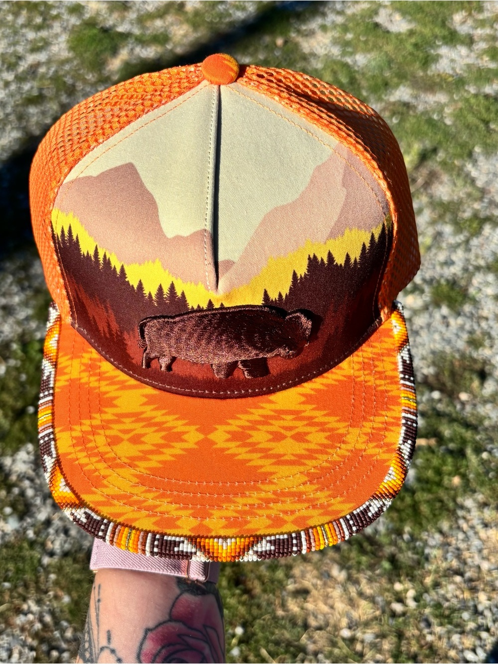 Orange Tribal Patch Trucker Hat with Buffalo Design